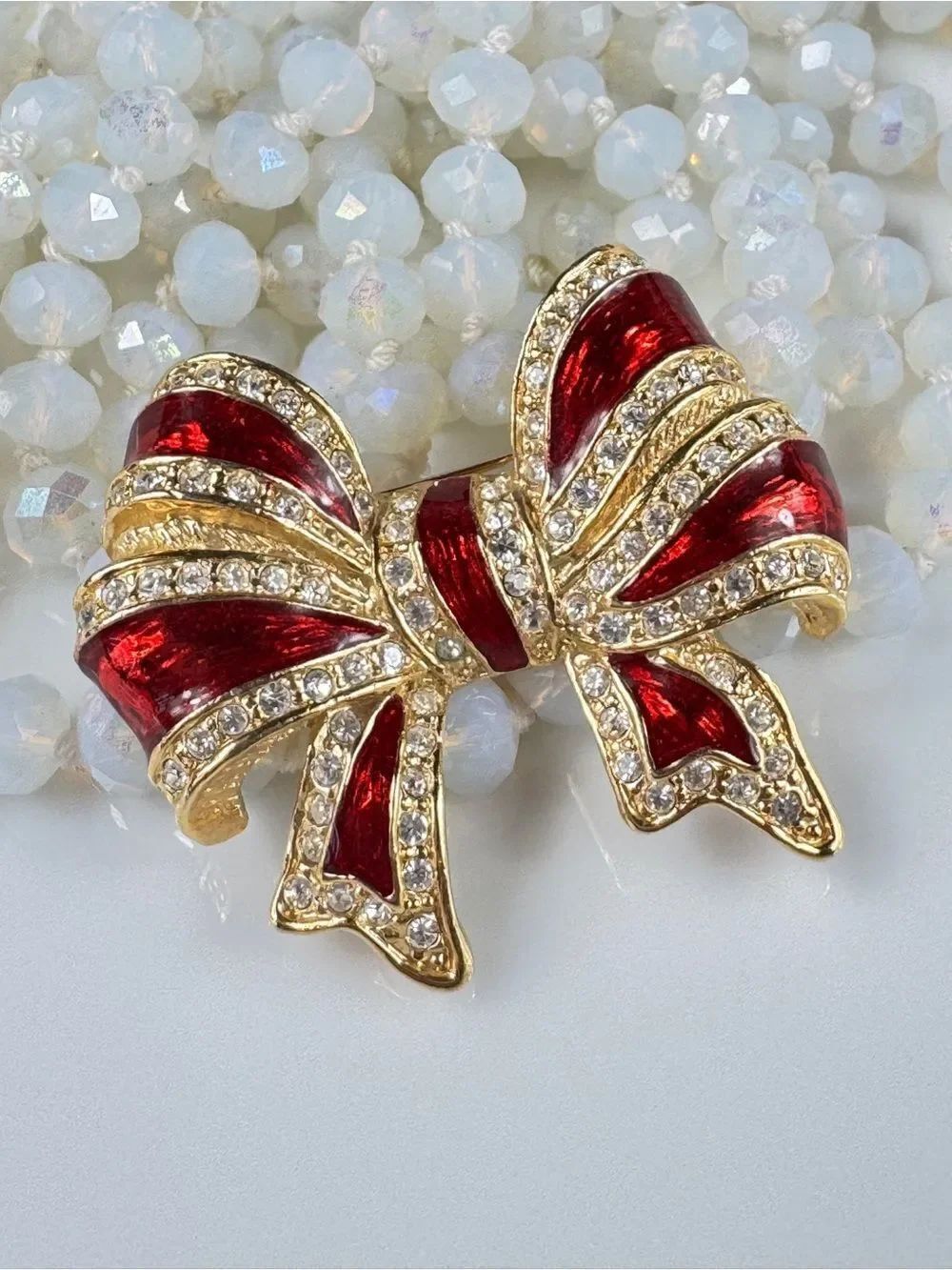 Roaman's Gold-Tone Bow Brooch with Red Enamel and Clear Crystals